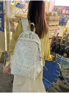 Korean ins-style star print backpack, large capacity casual school bag for daily students.