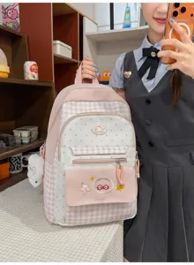 Detailed view of the pink and white checkered school backpack, showcasing sweet style and fine stitching.