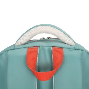 Close-up detail of teal backpack top handle and orange strap, sturdy fabric construction.