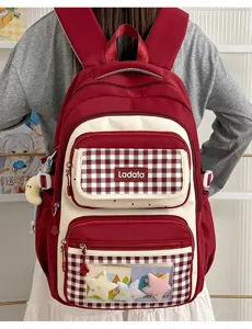 Large capacity plaid student backpack featuring a transparent ita window and cute plush pins.