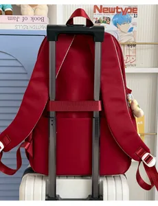 Solid red student backpack large capacity travel school bag with luggage strap for daily commute