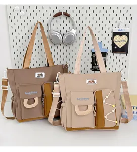 Gran bolso de hombro de lona con múltiples bolsillos para estudiantes y el trabajo.