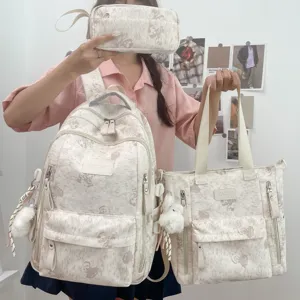 Details of the multi-compartment casual backpack set featuring cute bear print and pockets.
