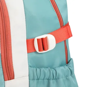 Detailed view of teal and white backpack featuring orange straps, zipper and plastic buckle.
