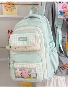 Detail shot of the cute plaid student backpack featuring a transparent star window ita design.