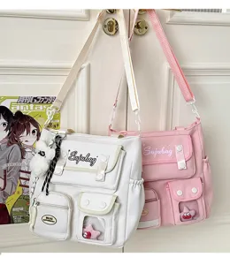 Canvas shoulder bag with multi-pockets and transparent window for students daily use.