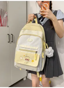 Yellow and white plaid backpack with cute star embroidery and plush pendant for students.