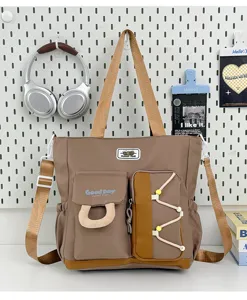 Gran capacidad bolso de lona de hombro con múltiples bolsillos para estudiantes y trabajo.