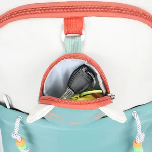 Close-up detail of cute cat ear pocket backpack with zipper and colorful bead drawstring.