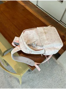 Korean ins style star print backpack, large capacity casual school bag for students.