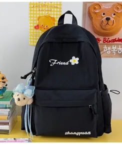 Black student casual backpack with embroidery details and cute bear pendant, stylish and light.