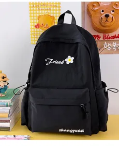 Casual black nylon backpack for students, featuring cute embroidery and multiple practical pockets.