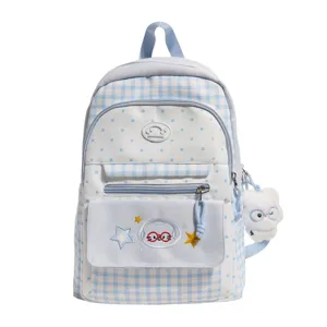 Cute blue and white plaid backpack with cartoon astronaut embroidery and cute plush pendant.