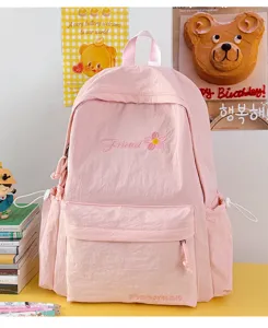 Japanese style solid color casual backpack for women, lightweight school bag for daily travel.