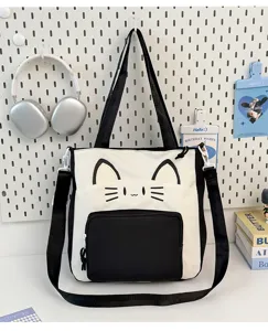 Cute cat canvas tote bag for teen girls, large capacity black and white shoulder bag.