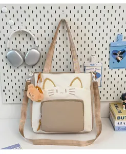 College style canvas tote bag, large capacity color-blocking cat shoulder bag for women.