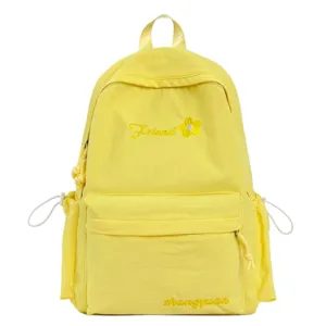 Casual solid yellow canvas backpack for college students daily commute lightweight school bag.