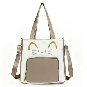 College style canvas tote bag with cute cat ears design, large capacity and shoulder strap.