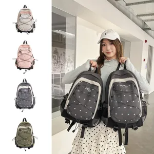 Cute heart print school backpack for teen girls, casual daypack with front drawstring.