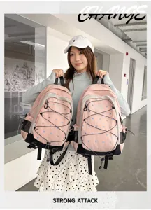 Pink and white cute heart print backpack, sweet style school bag for students and daily commute.