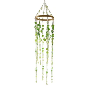 Hanging green leaf wind chime detail with bamboo ring and sparkling crystal bead chains.