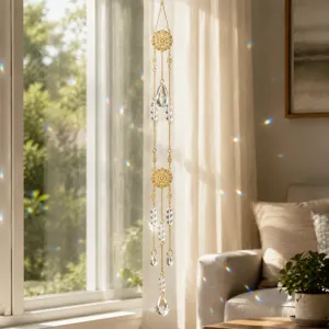 Crystal suncatcher window hanging decor with rainbow maker prism and gold metal chain.