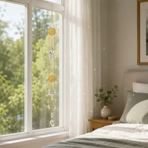 Exquisite crystal suncatcher hanging in the bedroom window, casting colorful rainbows across the room.
