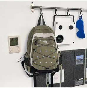 Olive green casual backpack with cute heart embroidery and bungee cord for school commute.