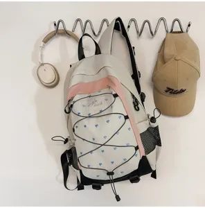 White and pink heart print student backpack, sweet and cool style campus commuting daypack.