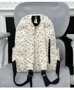 Casual corduroy backpack for women, cute heart and bow print travel school daypack.
