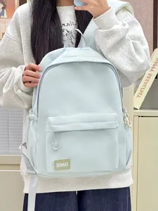 Casual solid color student backpack for women, large capacity daily commuter school bag.