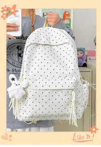 Korean style cute polka dot canvas backpack for women, large capacity casual student school bag.