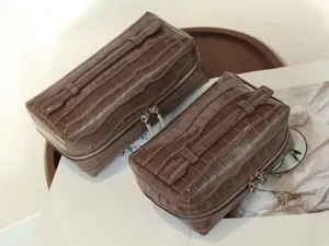Brown crocodile pattern cosmetic bag with double zipper, large capacity travel storage box.