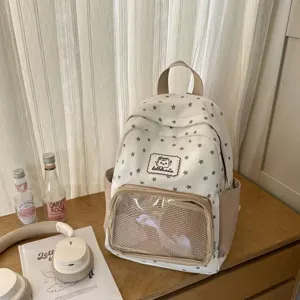 Detailed view of the cute star printed school backpack with clear front compartment and pocket.