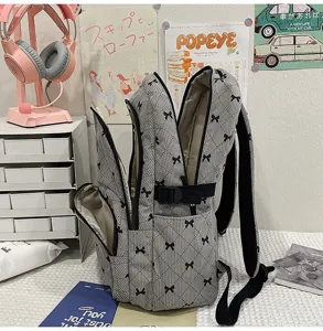 Cute quilted bow backpack for women, Korean style chic school bookbag for daily casual use.