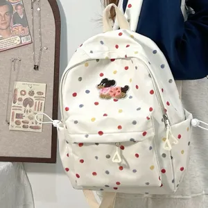 Hübscher Canvas-Rucksack für Damen mit bunten Punkten und süßem Hunde-Bestickungsdesign.