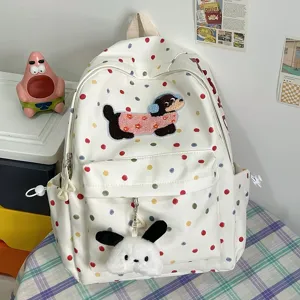 Niedlicher Cartoon Hund Leinwand Rucksack mit bunten Punkten, stilvolle Schultasche.