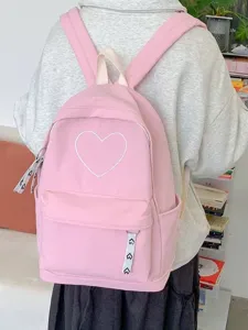 Pink canvas minimalist heart pattern casual school backpack for women and students.