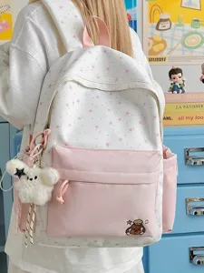 Korean style star print canvas backpack with cute puppy patch and plush bear charm for daily use.