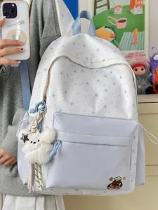 Cute cartoon star print backpack for women, large capacity student school bag with puppy pendant.