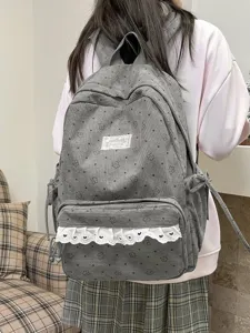 Sweet floral print corduroy backpack with cute lace trim, perfect school bag for daily use.