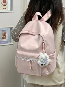 Sac à dos minimaliste rose doux pour femme avec bordure en dentelle mignonne et grande capacité.