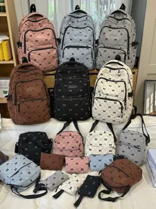 Korean style fashion cute bow embroidered multi-color backpack and crossbody bag set.