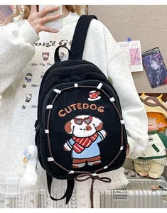 Black corduroy backpack with cute cartoon dog embroidery, stylish sweet school bag for girls.