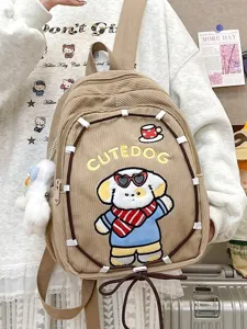 Cute corduroy cartoon puppy backpack for women, casual minimalist schoolbag with lovely dog patch.