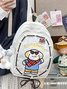 Cute cartoon dog embroidered corduroy backpack for women, stylish minimalist student schoolbag.