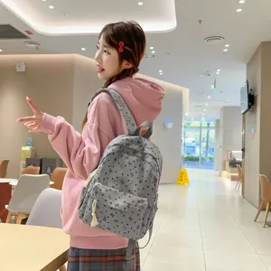 Korean style sweet cute bow backpack female large capacity college student school bag casual