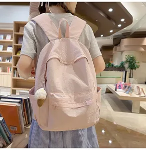 Casual pink minimalist student backpack, large capacity waterproof school bag for women.