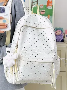 Korean style cute polka dot backpack for women, casual large capacity student school bag.