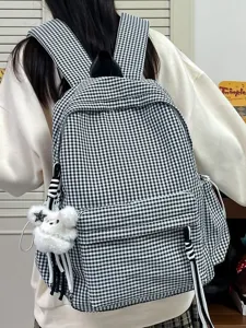 Black white gingham backpack for women, casual school bookbag with cute plush charm, back view